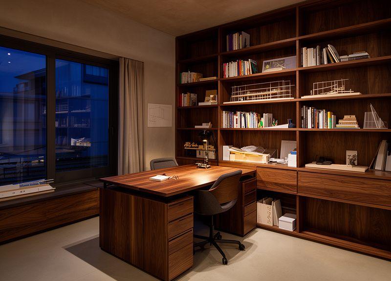 Partner desk and walnut shelving wall
