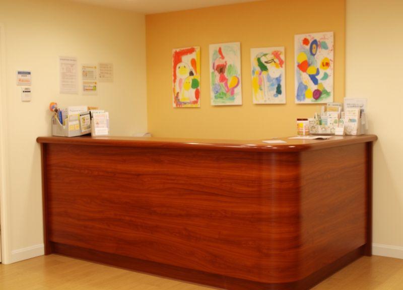 Reception desk, meeting table and child play unit